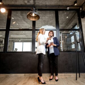 Bakery office with business women talking together