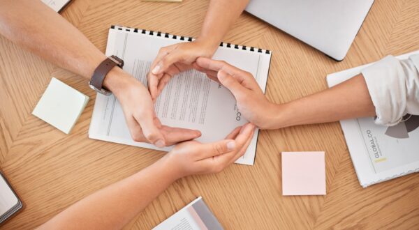 Corporate synergy, teamwork and hand in circle for employee collaboration in business office for su Corporate synergy, teamwork and hand in circle for employee collaboration in business office for su